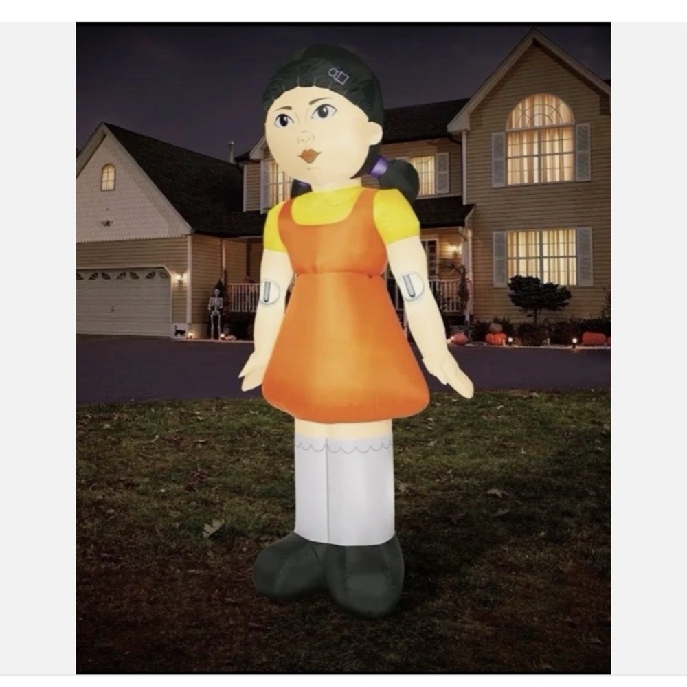 Giant Inflatable Doll in Orange Dress young hee